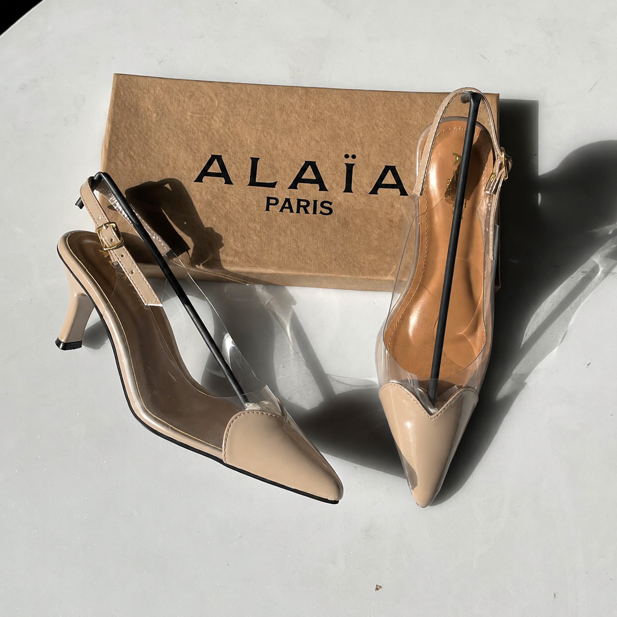 ALAÏA Women’s Transparent Pointed-Toe Slingback Kitten Heels