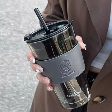 Reusable Transparent Tumbler with Straw and Leather-Look Sleeve